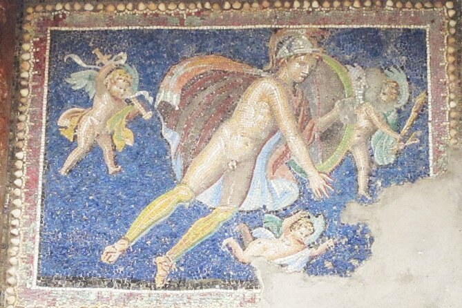 A mosaic of figures on a blue ground from a house at Pompeii