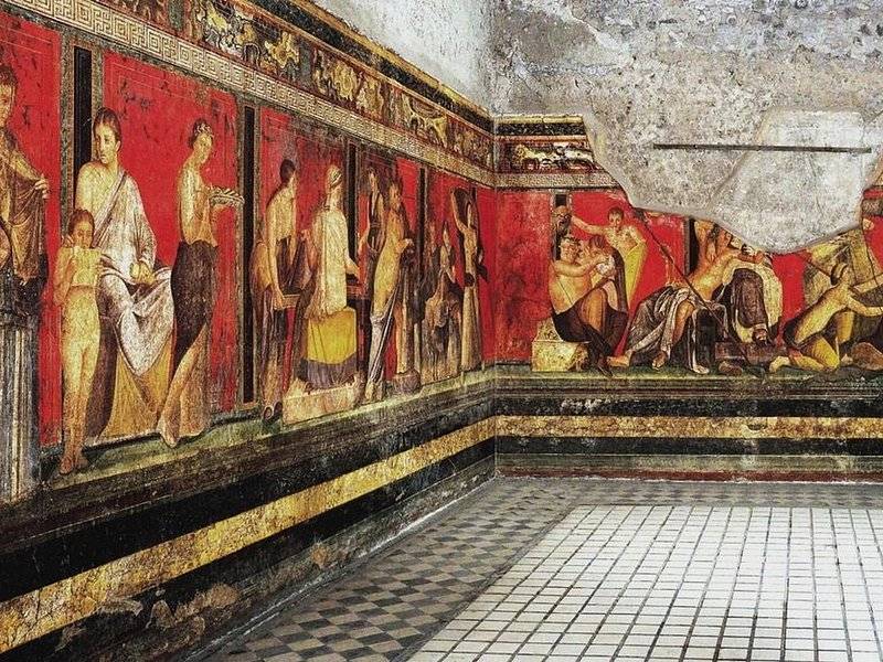 The painted hall of the Villa of the Mysteries at Pompeii, the frieze running round three walls
